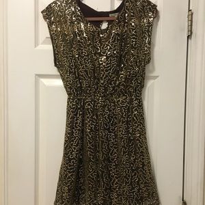 Sequined, above the knee open back dress